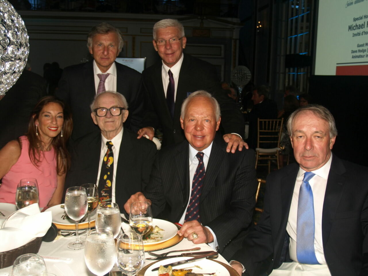Standing left to right - Peter Varadi, Rejean Houle, Seated left to right - Susan Varadi, Red Fisher, Yvon Cournoyer, Fred Steer (CFO Montreal Canadians) (Photo: Jack Gurevitch)