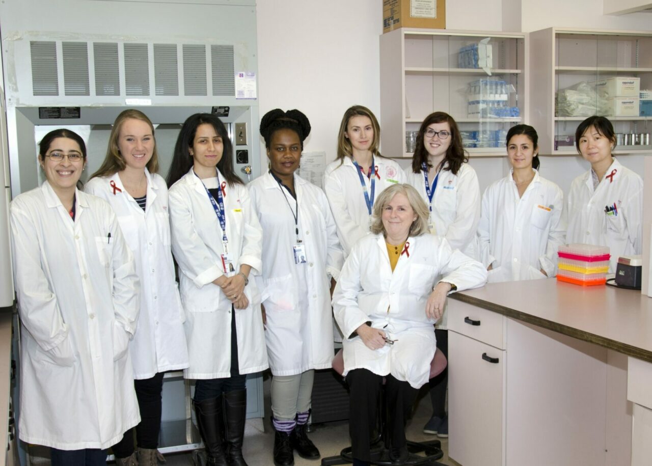 Dr. Nicole Bernard (sitting) and her team from the HIV and Innate Immunity Research Laboratory