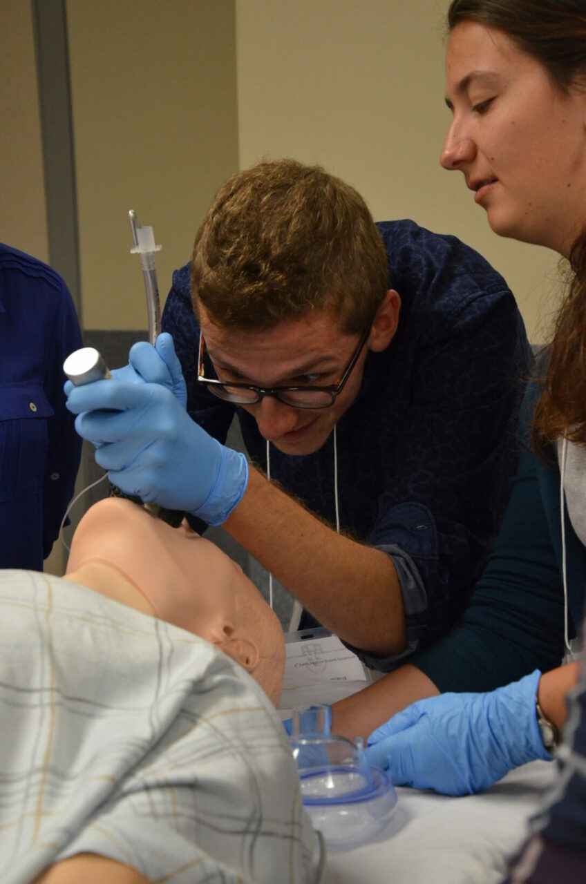 Residents demonstrating how to perform an endotracheal intubation to  students. (Photo: Cher Tieng Ting) 