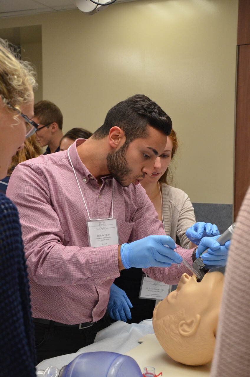 Residents demonstrating how to perform an endotracheal intubation to  students. (Photo: Cher Tieng Ting) 