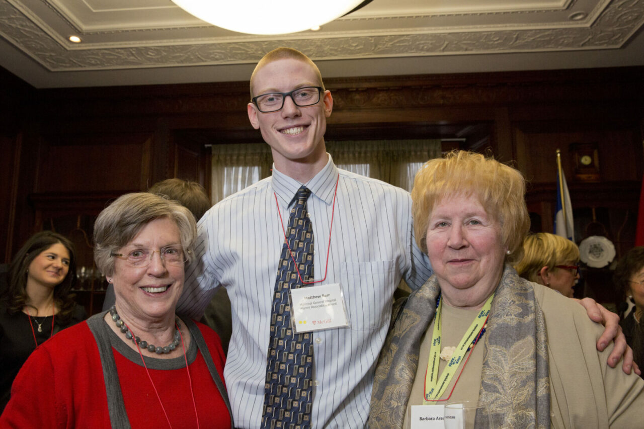 Why did Matthew Barr receive an award from the Alumnae Association of the Montreal General Hospital School of Nursing?  “It was for humanitarian aid work and community involvement,” said Mr. Barr, a U3 student in the Bachelor of Nursing Integrated Program at the Ingram School of Nursing.  “I worked in Alaska as a bush pilot and as a camp counselor for underprivileged native kids. We taught them how to fly. Then, I was learning to be a pilot with an emergency response team in Texas when the earthquake hit Haiti. I went and organized some mobile clinics with Health Partners International Canada.” It was his experience in Haiti that made Mr. Barr realize that he wanted to pursue his nursing studies at the university level.  Barbara Arsenau (pictured, right), one of two representatives, with Joan Clark (left), present from the Association, said, “The Association is going to be 110. It was founded in 1905 and the last graduates were 1972, then there was no more training given in the hospitals, they went to the CEGEPs. We can’t recruit new members. We want the awards to go the students who are involved in the CEGEP program and who come to McGill. We have two streams.” (Photo: Nicolas Morin) 