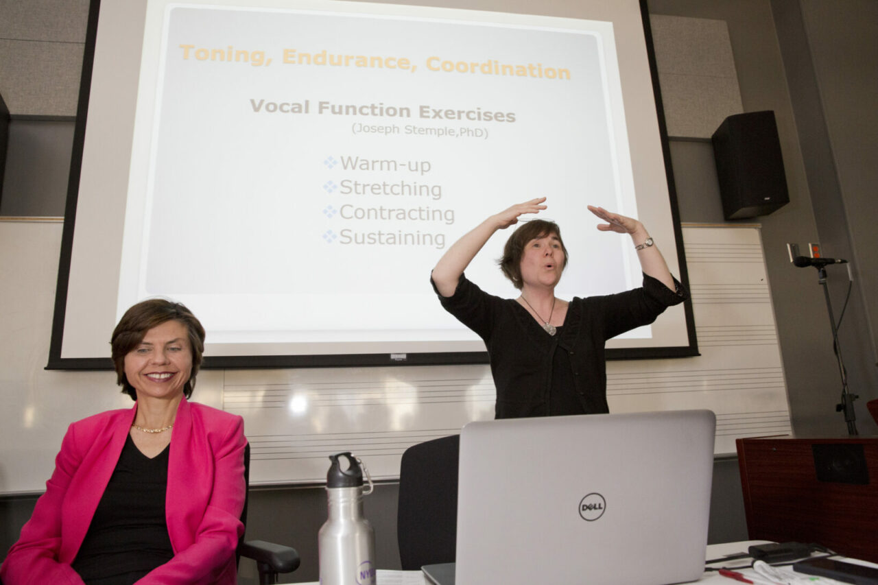 Glenna Waters demonstrating voice exercises prescribed by SLPs. Photo: Nicolas Morin