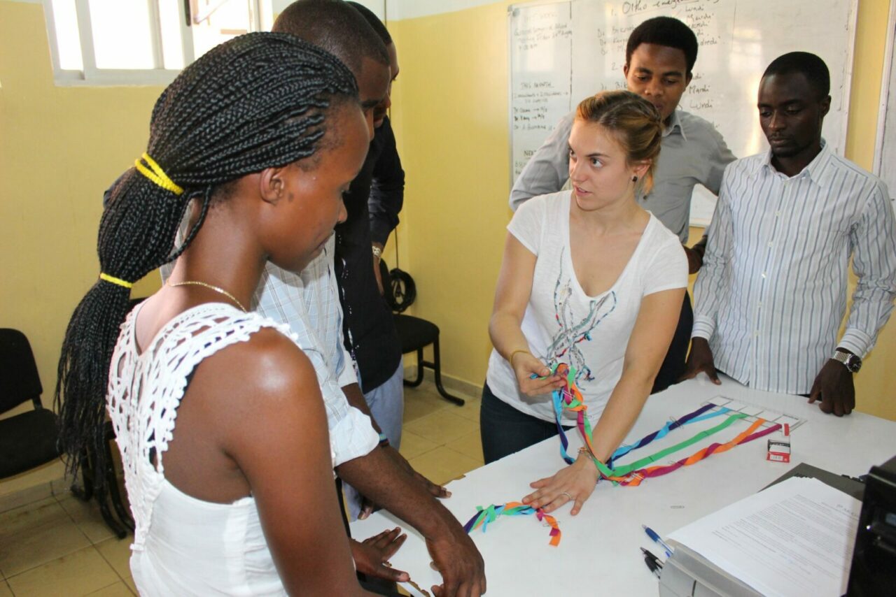McGill medical student Annie Lalande teaching the brachial plexus to Rwandan medical students with a home-made model. Photo: Ryan Adessky