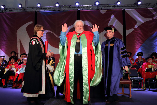 Philip Branton acknowledges the applause after receiving the McGill Medal as part of the Science Convocation ceremony on June 6. / Photo: Owen Egan